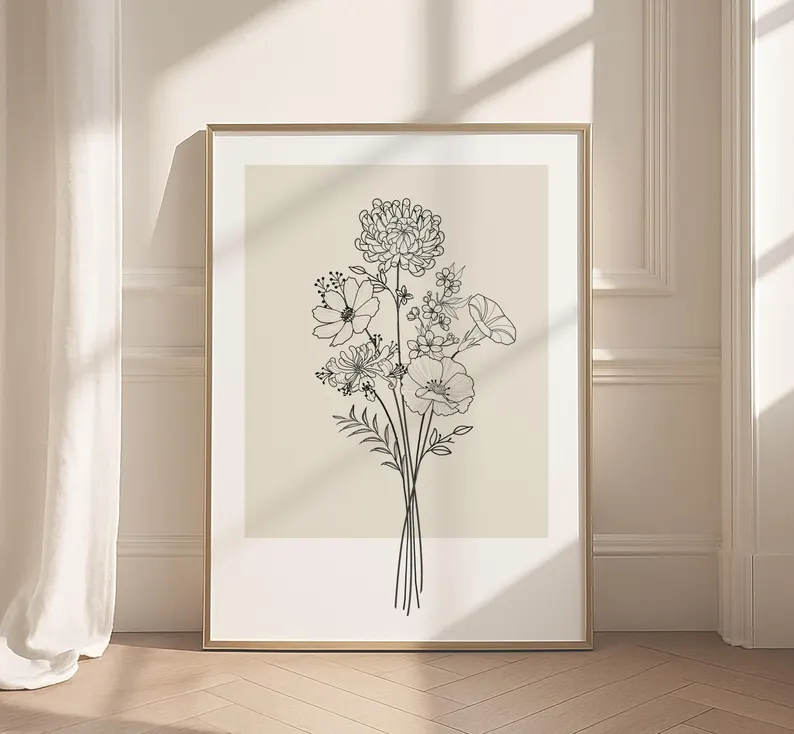 Minimalist line art flower bouquet print in gold frame leaning against white wall, elegant mom sentimental gifts for bedroom. Etsy