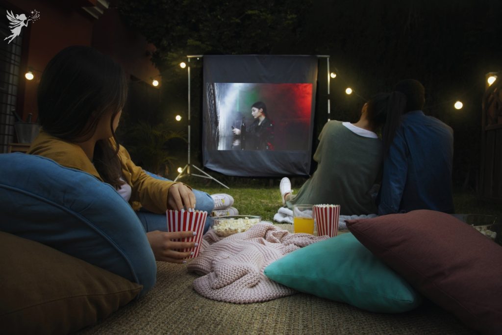 movie night outside eating popcorn