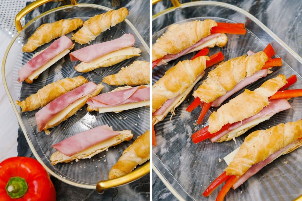 Two step photos showing crab croissants recipe assembly with ham layered over cheese inside each croissant and red bell pepper strips tucked in on the sides to create crab claws.