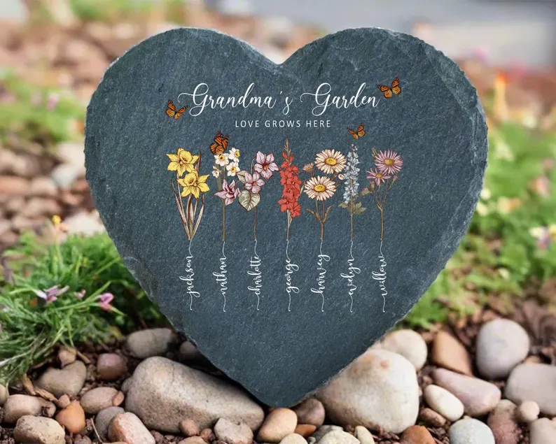 Heart shaped slate garden stone engraved with Grandma's Garden and personalized birth flowers with grandchildren names, outdoor grandma gifts from grandkids.