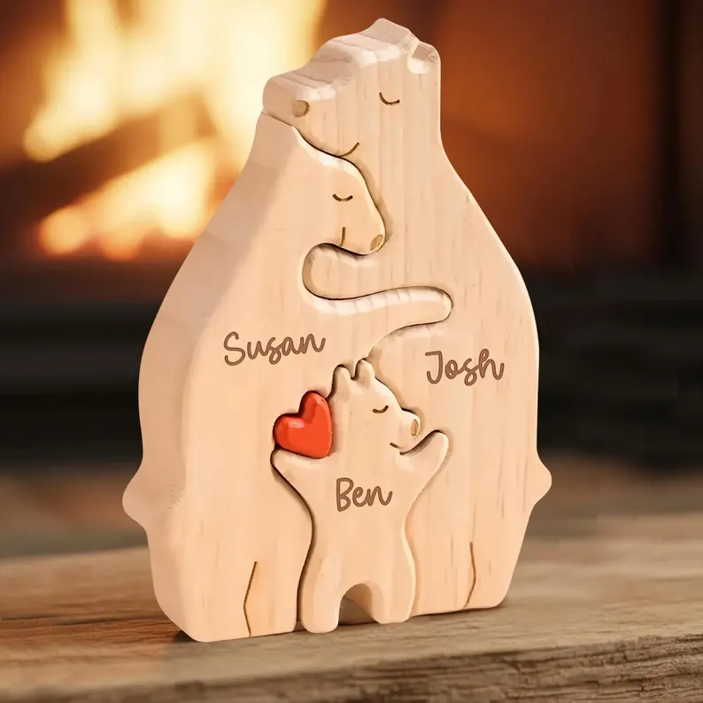 A personalized wooden bear family puzzle engraved with names Susan, Josh, and Ben, a charming first Father's Day gift idea displayed by a warm fireplace. Etsy