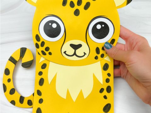 Printable cheetah paper bag puppet with spots and big eyes for safari party crafts and activities