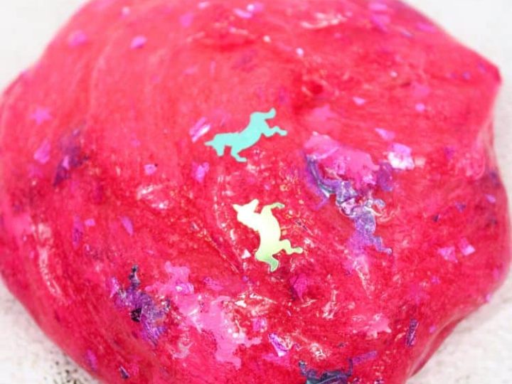 Bright pink glittery unicorn slime with confetti unicorn shapes is one of the most fun unicorn party crafts and activities