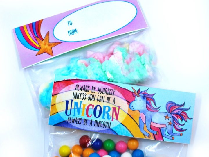 Printable unicorn party favor treat bags filled with colorful candies are simple and adorable unicorn party crafts and activities