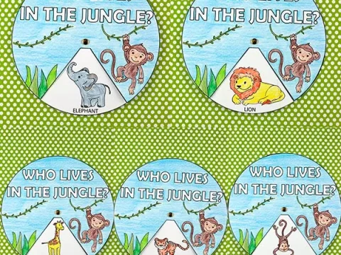 Printable jungle animal spinner crafts featuring an elephant, lion, giraffe, tiger, and monkey for safari party crafts and activities