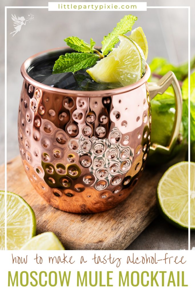 a crisp close up image of a moscow mule mug with text overlay how to make a tasty alcohol free-moscow mule mocktail