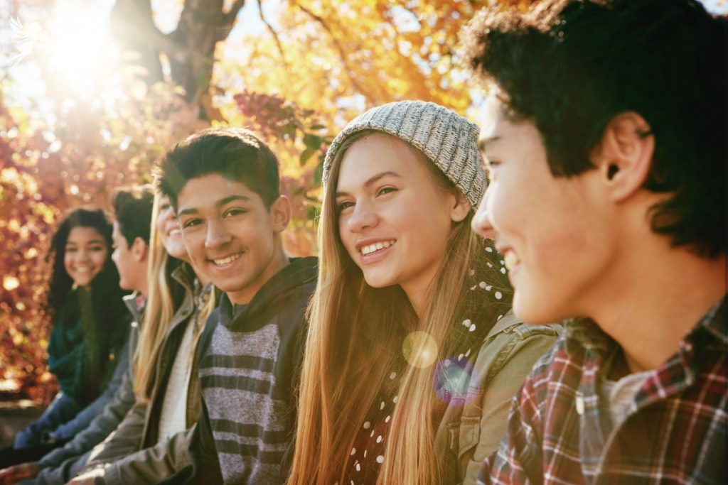 fall teens outdoors sunshine smiling