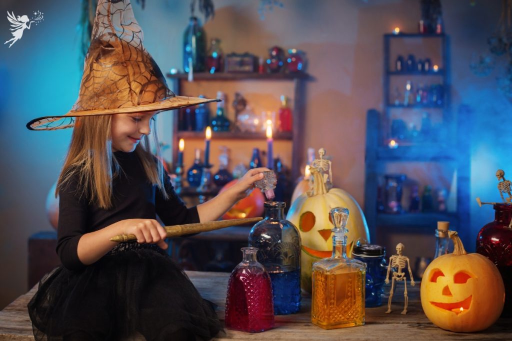 girl at a potion party in halloween outfit