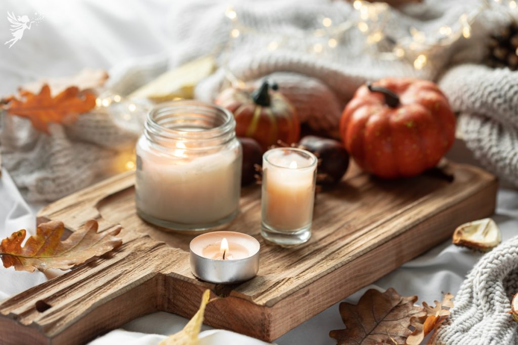 fall themed spa with candles, pumpkins soft lighting