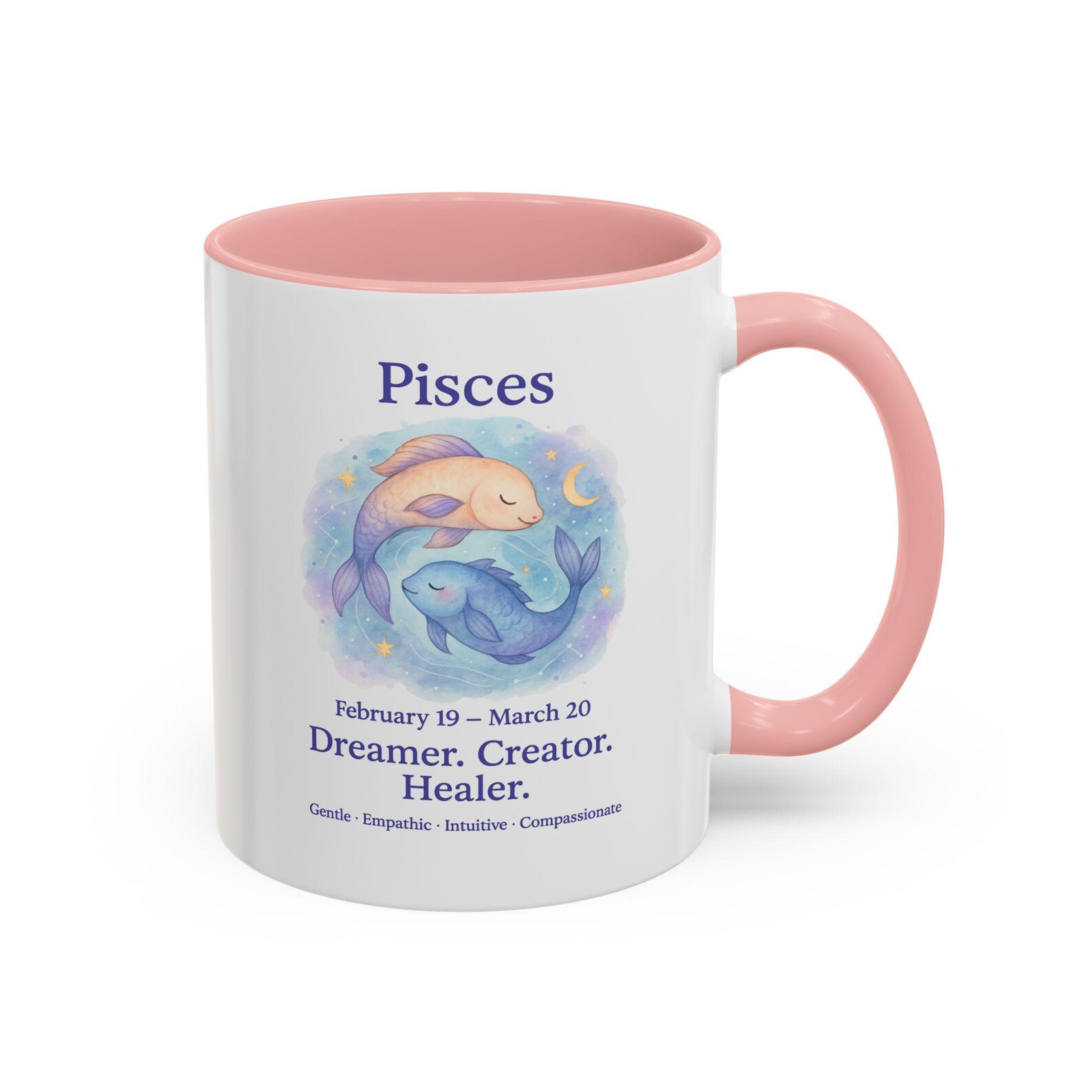A white and pink ceramic mug printed with a dreamy watercolor Pisces fish illustration and zodiac traits, a sweet February birthday gift idea.