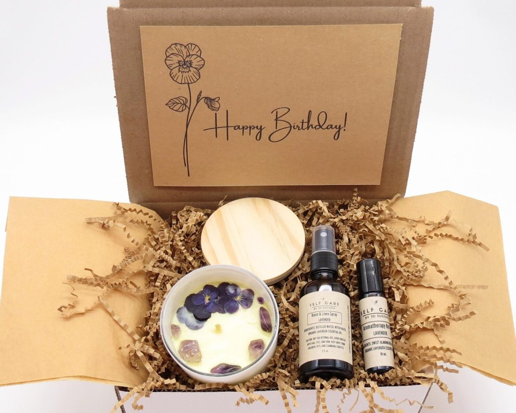 an aquarius/purple themed self care birthday gift box from etsy