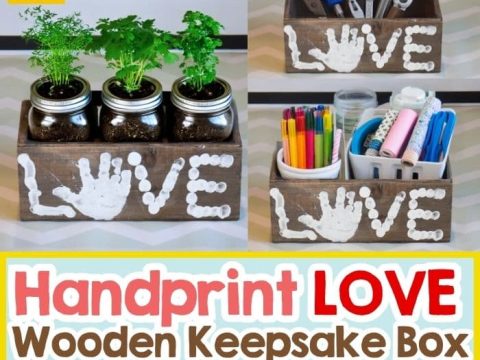 A rustic wooden floral centerpiece box with white handprint lettering, a meaningful homemade gift for grandparents.