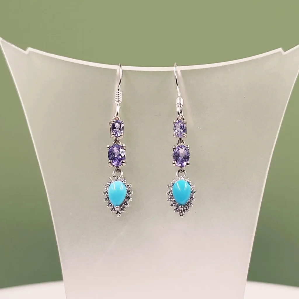 Silver drop earrings featuring tanzanite and turquoise gemstones, beautiful birthstone jewelry among December birthday gift ideas.
