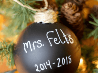 A decorative chalkboard ornament with hand-drawn lettering, a nostalgic and personal homemade gift for grandparents to cherish.