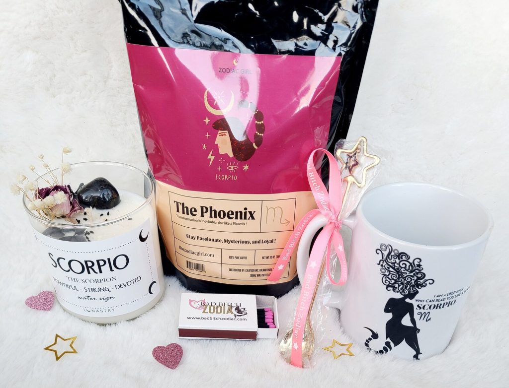 A Scorpio themed gift bundle including a zodiac candle, coffee bag, mug and star spoon, among the most creative October birthday gift ideas for her.