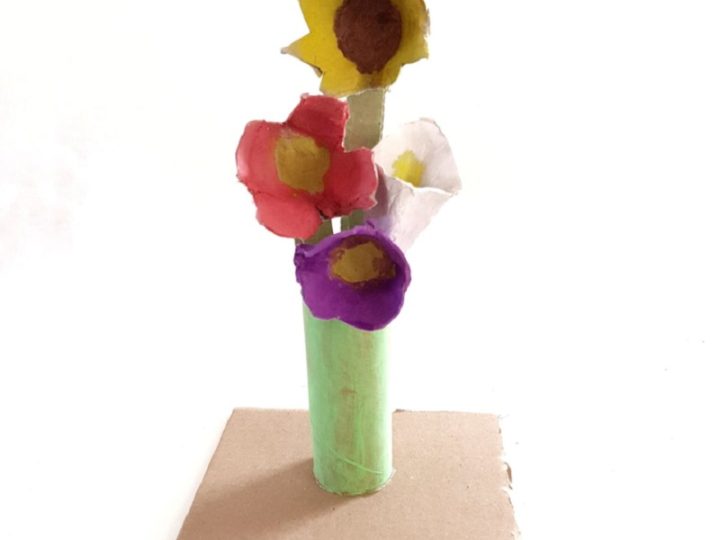 A cheerful bouquet made from painted egg carton flower shapes, a creative recycled homemade gift for grandparents.