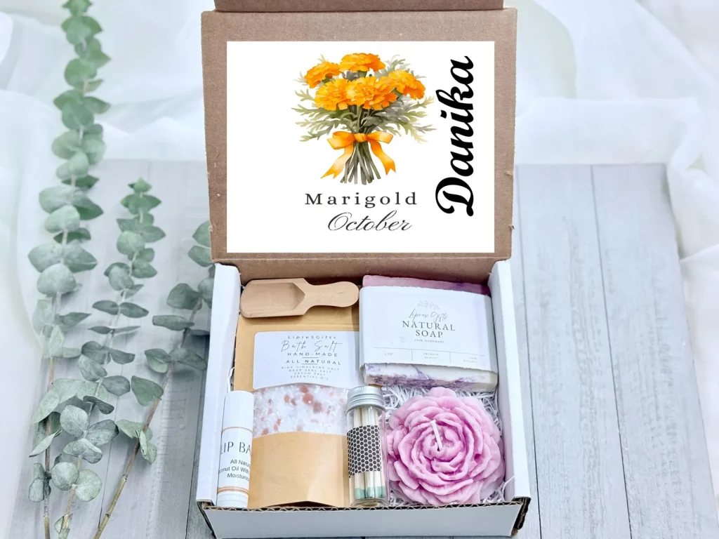 A personalized marigold themed self care gift box containing natural soap, bath salts, a lip balm and a floral candle, among the sweetest October birthday gift ideas.
