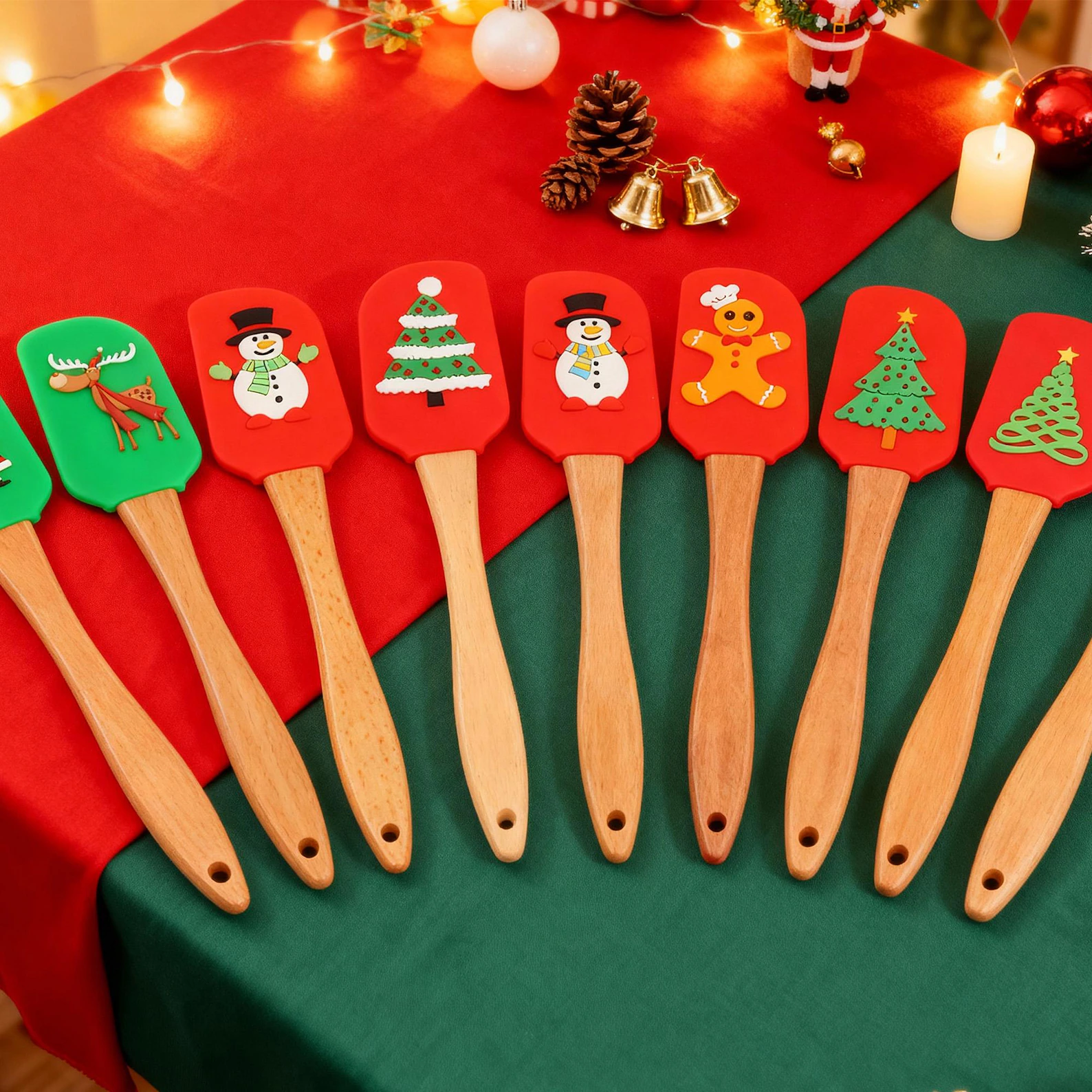 Set of colorful silicone spatulas with wood handles featuring snowman, reindeer and Christmas tree designs, fun neighbor Christmas gift ideas for bakers.