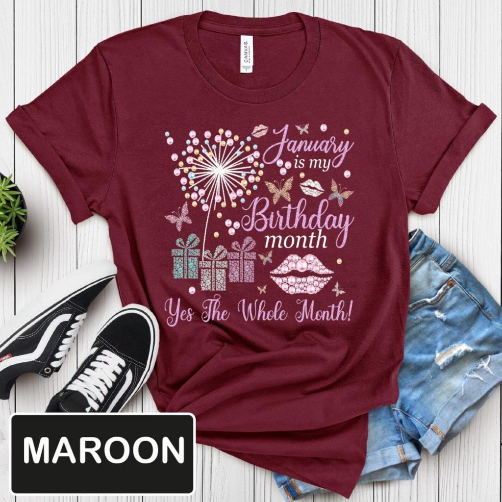 A maroon January is my Birthday Month graphic t-shirt with a glitter dandelion and gift box design, a fun January birthday gift idea.