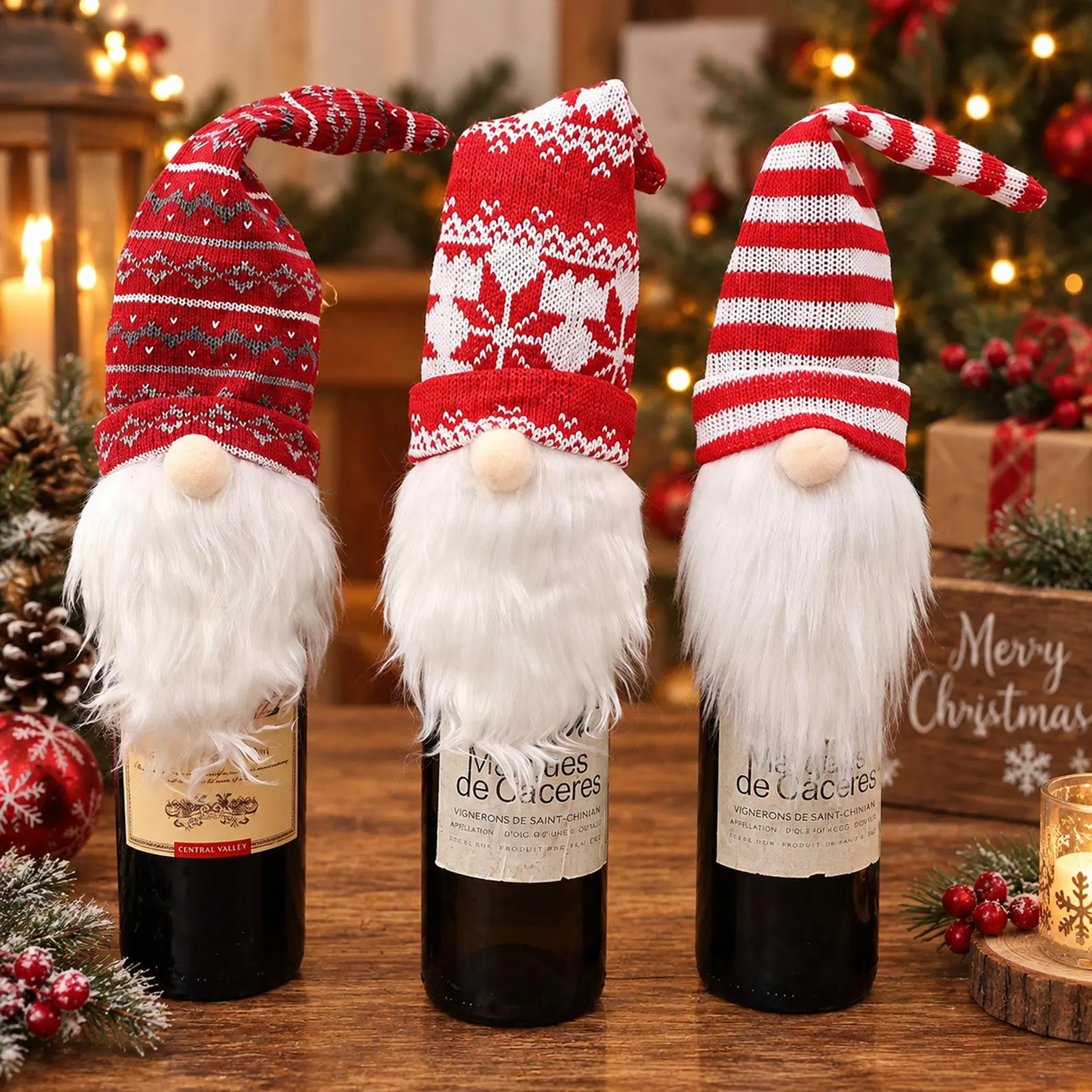 Three red and white knit gnome toppers with fluffy white beards dressed over wine bottles in a festive holiday setting, whimsical and reusable Christmas hostess gift ideas that instantly dress up any bottle of wine.