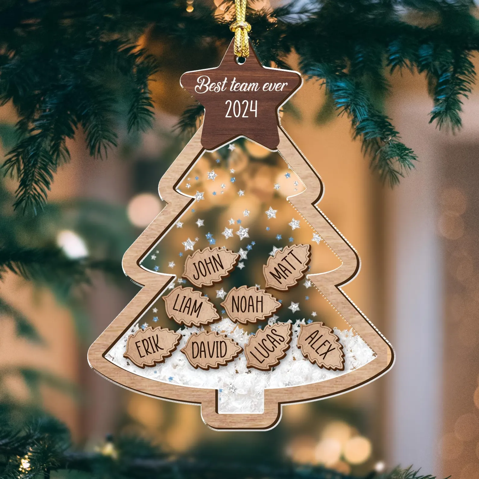 Personalized Best Team Ever 2024 Christmas tree shaped wooden ornament with individual team member name tags, unique Christmas gift ideas for coworkers to share together.