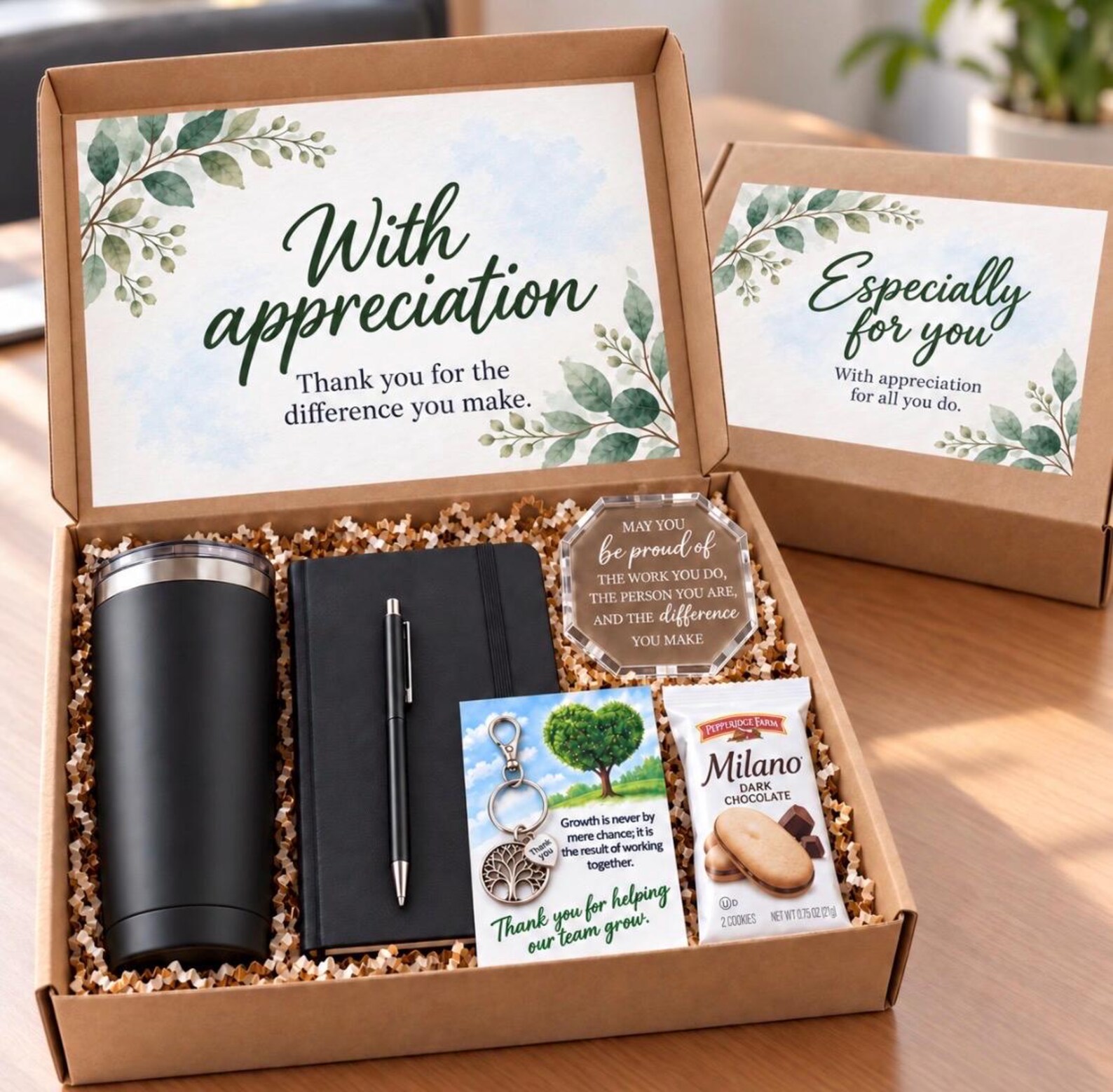With Appreciation gift box containing tumbler, notebook, pen, keychain, acrylic token and Milano cookies, among the most thoughtful Christmas gift ideas for coworkers.